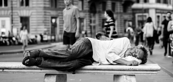 Man on bench, Largo di Torre Argentina, Roma, Italy