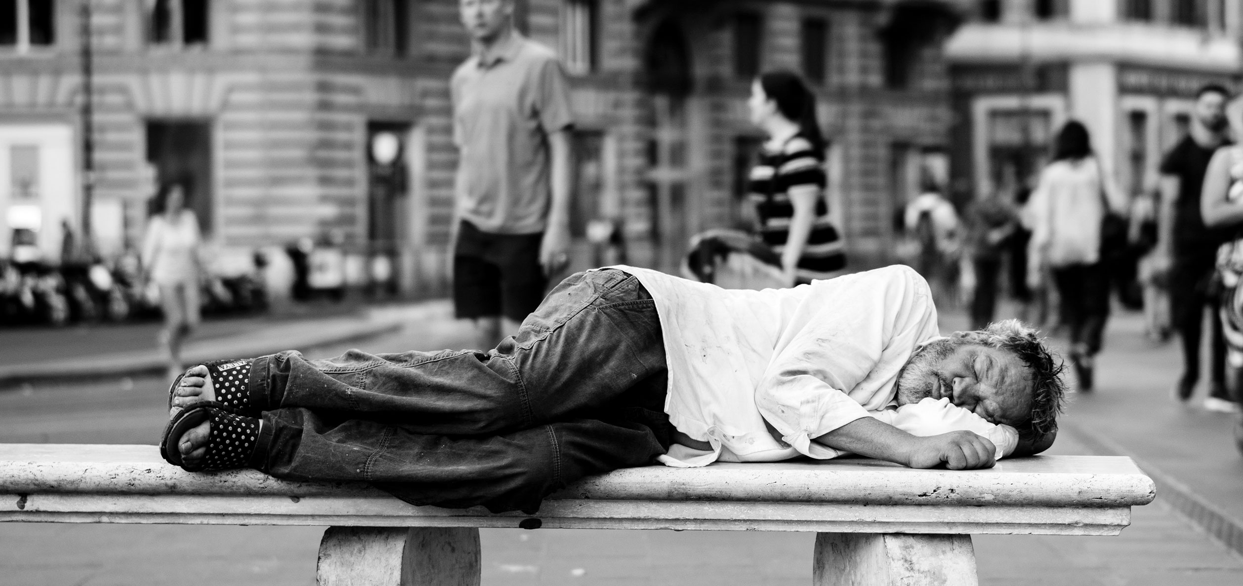 Man on bench, Largo di Torre Argentina, Roma, Italy
